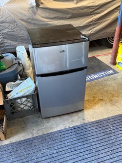 3.1cf Dorm Size mini-fridge by Willz. Stainless & Black.  Excellent condition.