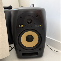 Two KRK VXT8 powered studio monitors (8-inch professional speakers used for music production)