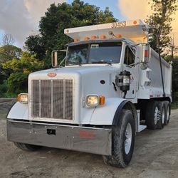 2000 PETERBILT 357
DUMP TRUCK
 SPREADER THIRD 
AXLE 
CUMMINS ISM 430 HP ENGINE 
8LL 