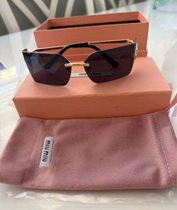 Miu Miu women rimless sunglasses