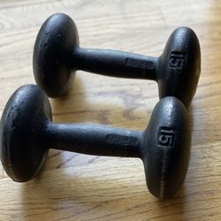 A Pair Of 15lb Cast Iron Dumbbells 