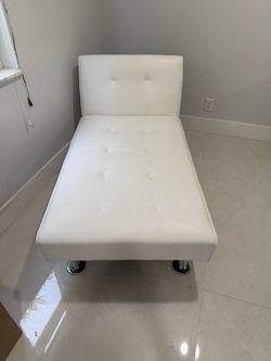 Chaise  faux, leather lounge chair