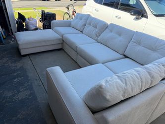 Large Light Gray Sectional Sofa with Ottoman