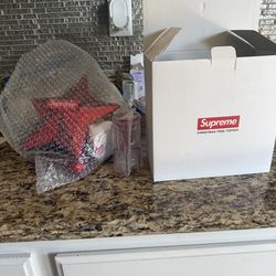 supreme christmas tree topper