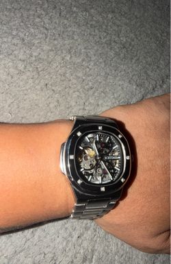 Ice time skeleton men’s 43 mm Automatic skeleton dial SS  with genuine  diamonds,box included retail price over 900.00