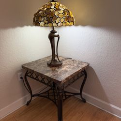 Two End Tables And A Round Coffee Table