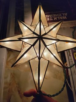 Lighted Christmas tree  topper. First pic shows lit