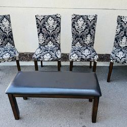 Chairs And Bench With Covers
