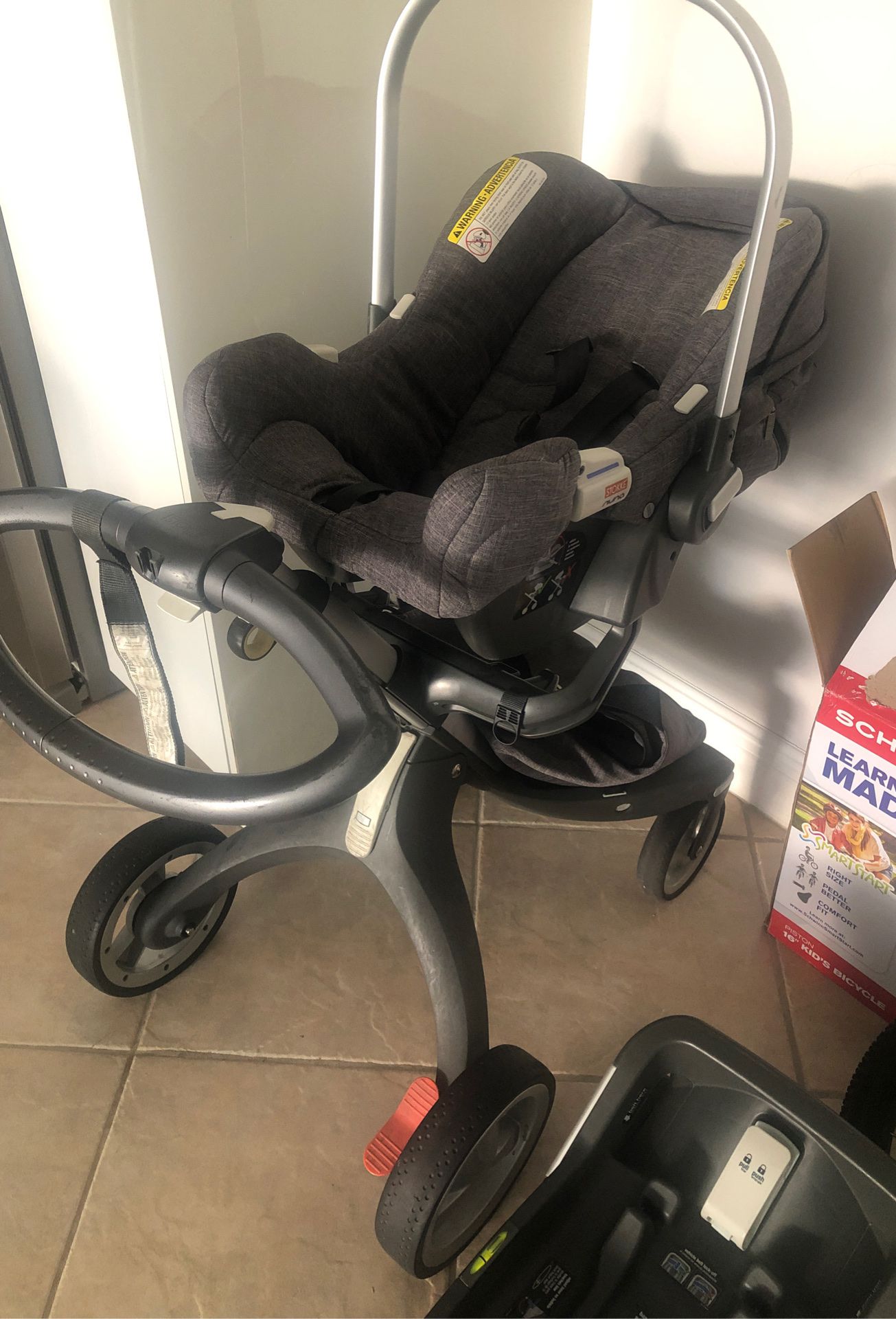 Stokke stroller and nuna car seat included in the same price