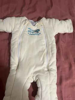Baby Merlin’s magic sleep suit