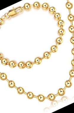 New 18 k yellow gold necklace and bracelet set