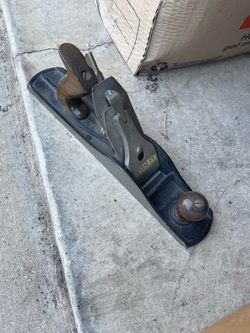 Vintage Stanley hand plane, specifically a No. 5 Jack Plane