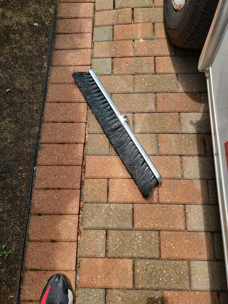 Brand New Milwaukee Dustless 24-in Broom Sweeper