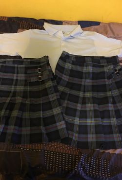 Holy trinity school skirts and blue polo