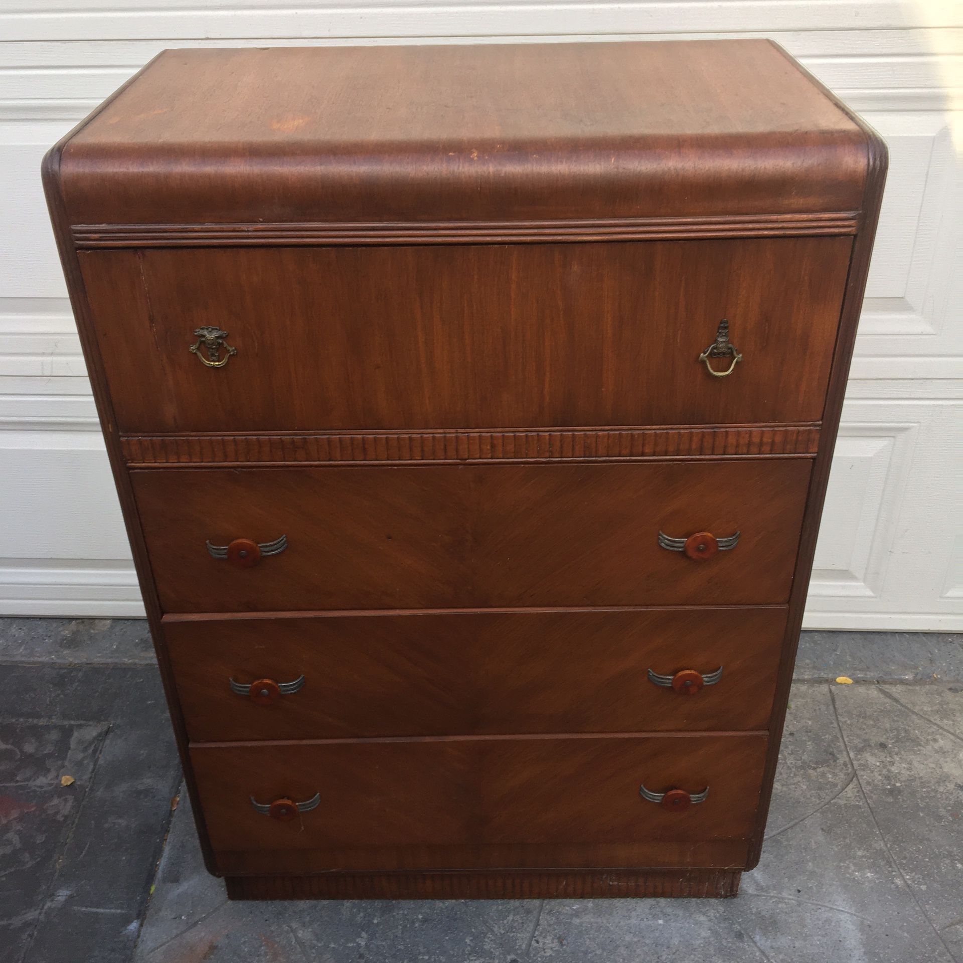 Beautifully crafted antique/vintage art deco solid wood 4-drawer dresser. Measurements 31 x 18 1/2 x 43.