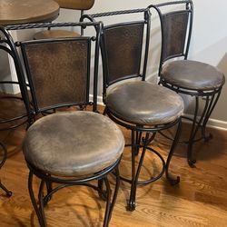 3 Swivel Counter Stools 