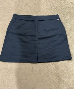 Armani Exchange Navy Blue Women's mini Skirt size 10 Elegant navy blue skirt perfect for any occasion. Features a sleek design for a flattering fit. E