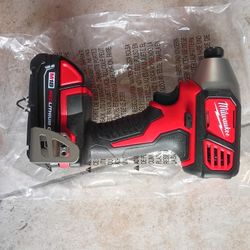 Milwaukee Hex Impact Drill With Battery.