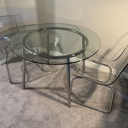 Glass Table With Four Chairs
