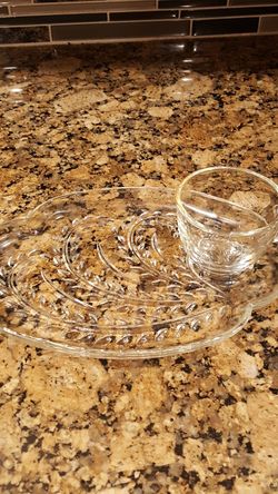Glass serving platter with tea cup