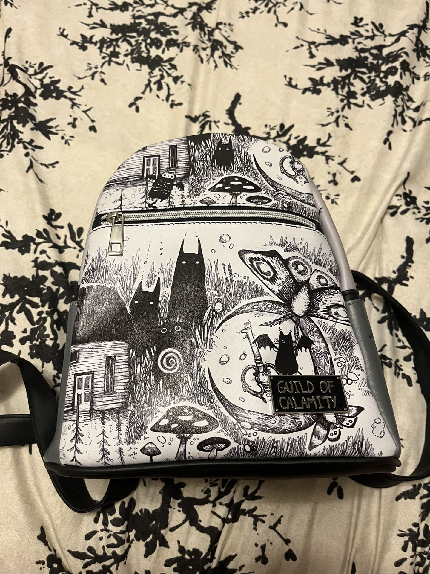 Guild Of Calamity purse-backpack