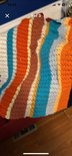($10)Multicolored crochet Afghan