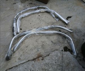 66 Chevelle wheel wells trim/ moulding NEW