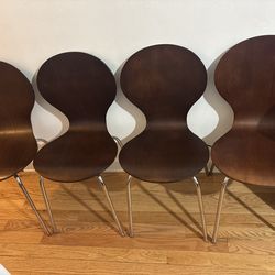 Vintage Mid-Century walnut chairs .