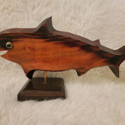 A vintage mounted hand-carved wooden shark sculpture that also functions as a pen holder 21.5" width x 11" height