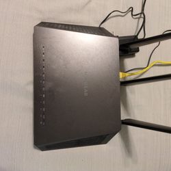 Netgear Nighthawk AC1900 Model R7000 Router and  Arris  Surfboard  SB8200