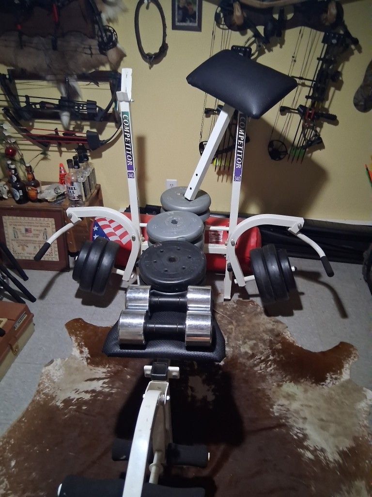 Weight Bench With Assorted Cement Weights And 2- 25lb Dumb Bells OBO