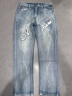 Amiri Lightning Bolt Graphic Jeans