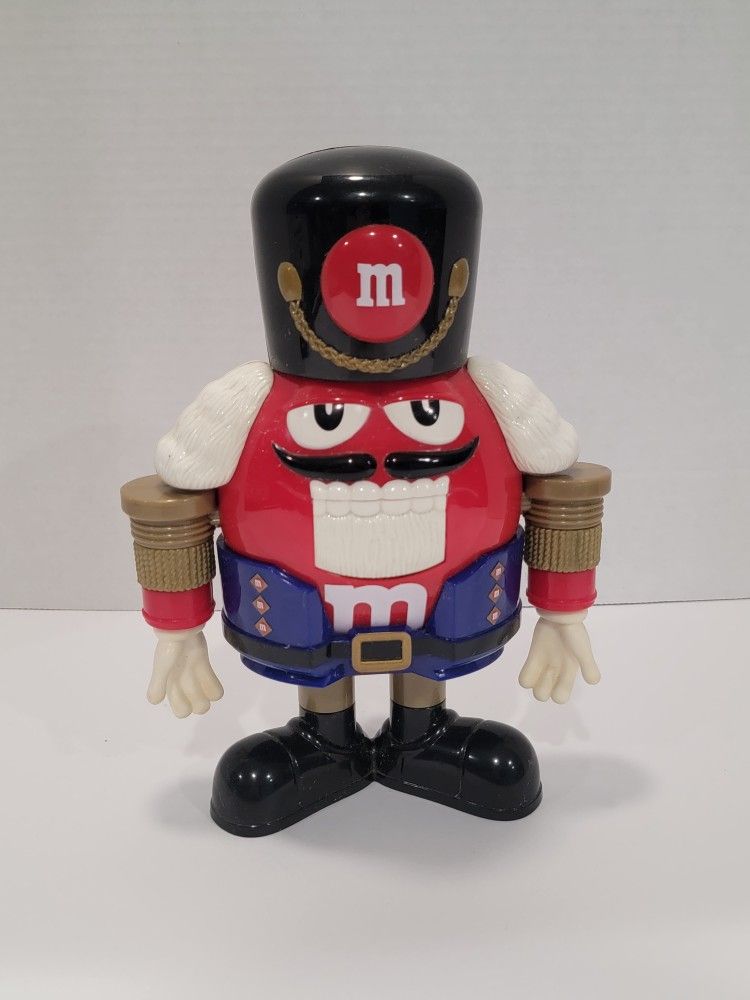 Red M&M Plastic Nutcracker Toy Soldier Candy Dispenser 9.25”