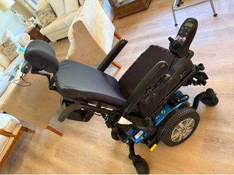Quantum j4 motorized electric wheelchair