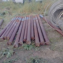 Eight foot long metal fence pipe five inch diameter