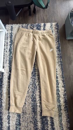 Tan Nike sweatpants Size Large