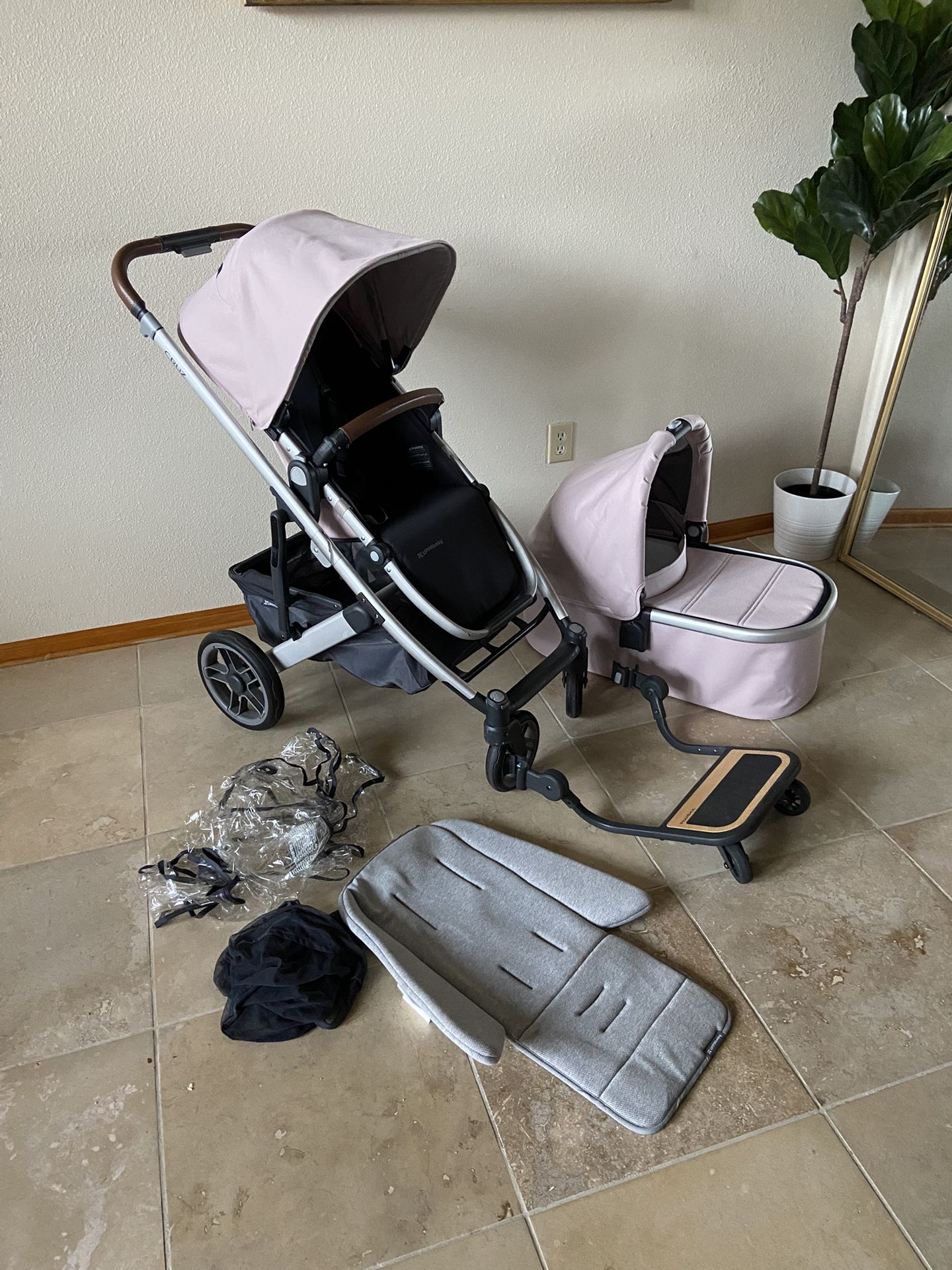 Uppababy Cruz V2 Stroller With Bassinet And Piggyback Board Pink