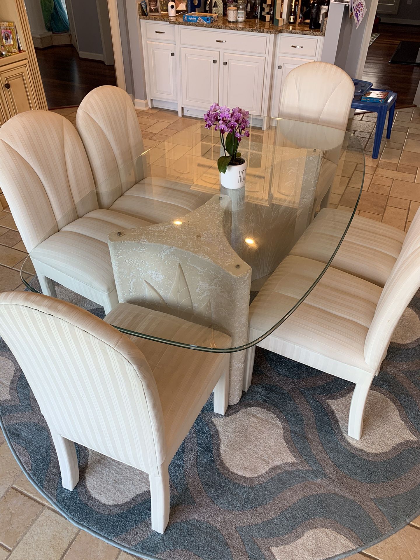 Contemporary glass table with six chairs