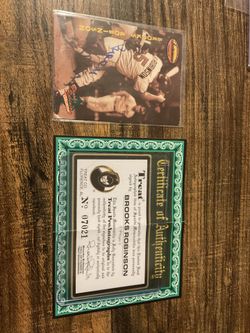 1993 Brooks Robinson autographed baseball card with COA Baltimore Orioles legend HOF