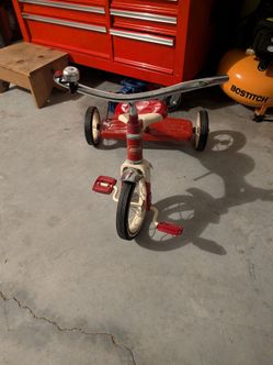 Radio flyer tricycle and Huff Spiderman bike with training wheels