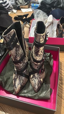 Leather snake heeled boots from Guess
