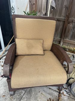 Outdoor sturdy chair with cushions