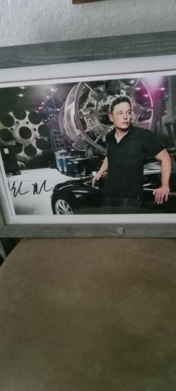 Signed Elon Musk Tesla photo