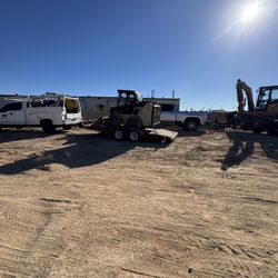 Excavator And Bobcat