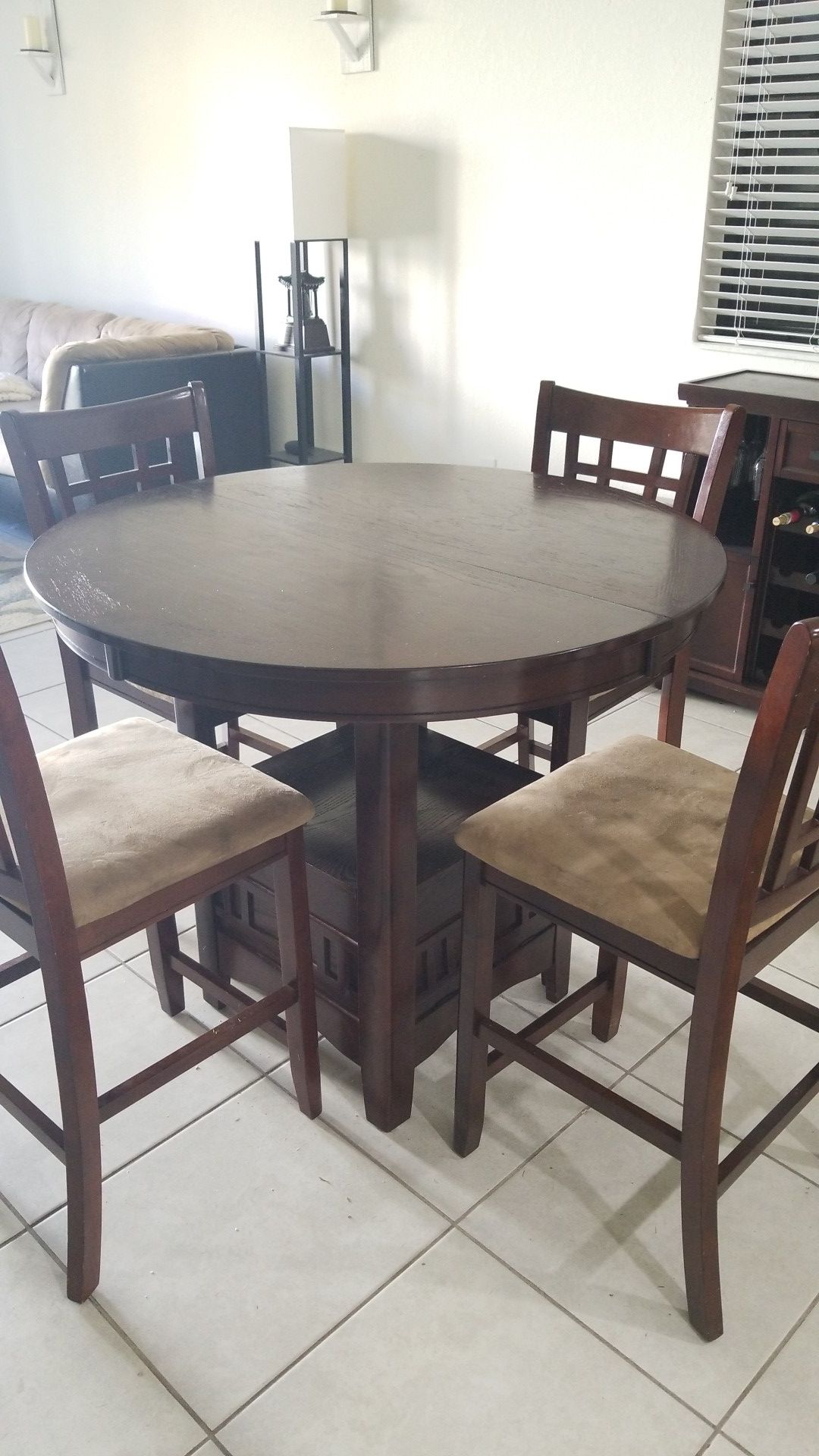 Breakfast table, with 4 chairs. Has leaf, 150$