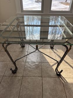 Kitchen table rod iron with glass top four chairs