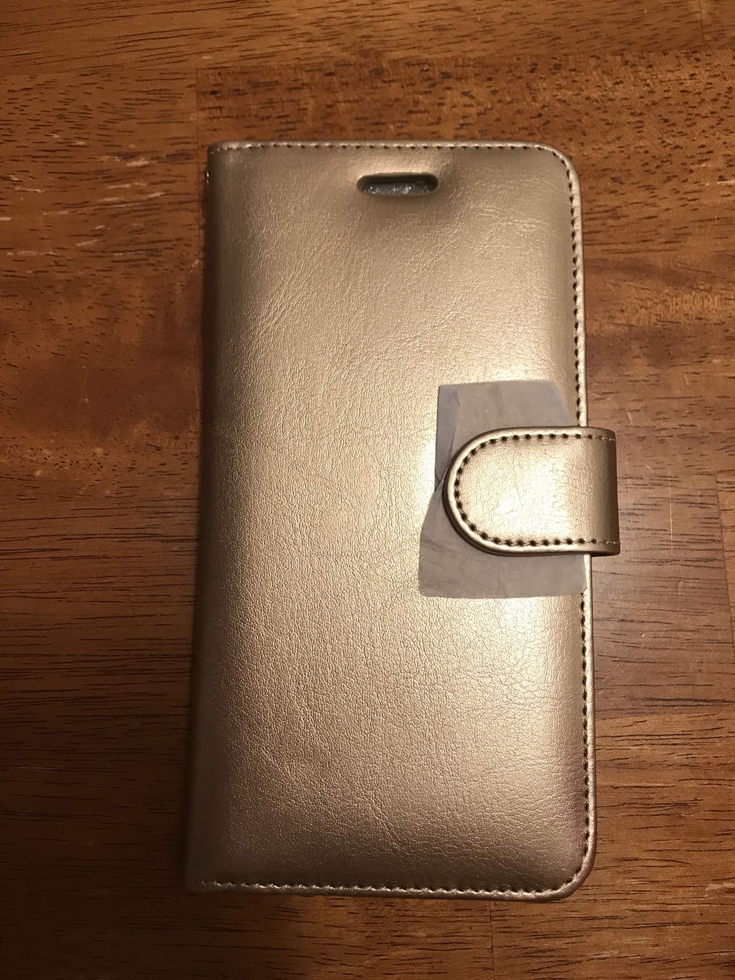 Gold iPhone 7 Plus case and wallet combo