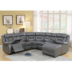 Grey Motion Sectional With One Recliner Chair And One Push Back Chaise Brand New In Box Firm Price $1,500