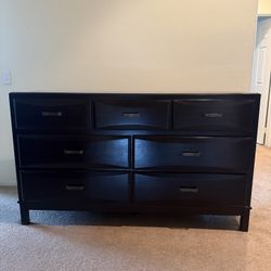 Solid wood black dresser - good condition