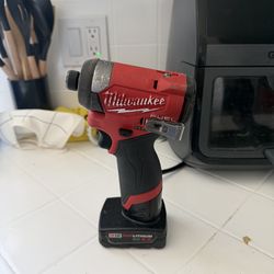 M12 impact milwaukee